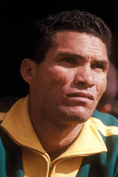 Premium editorial image of Brazilian football legend Garrincha showcasing his skills at the men's World Cup between 1953 and 1972.