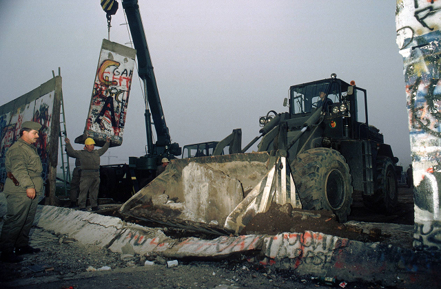 An iconic historical photo of the fall of the Berlin Wall from IMAGO's extensive archive for documentary and editorial storytelling.