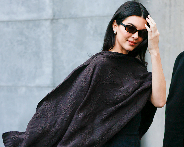 Kendall Jenner walks in a stylish outfit, highlighting premium global street style photography at IMAGO.