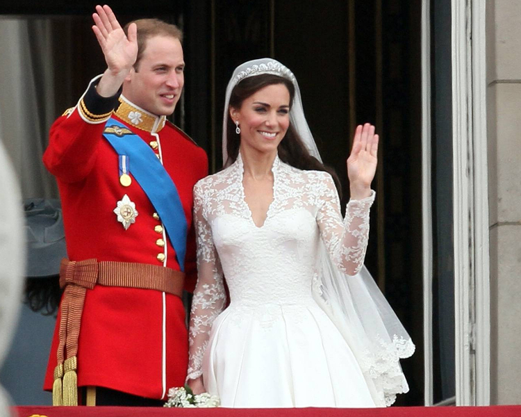 Prince William and Princess Kate wave from the palace balcony at their wedding, representing iconic royal photography of princes and princesses.